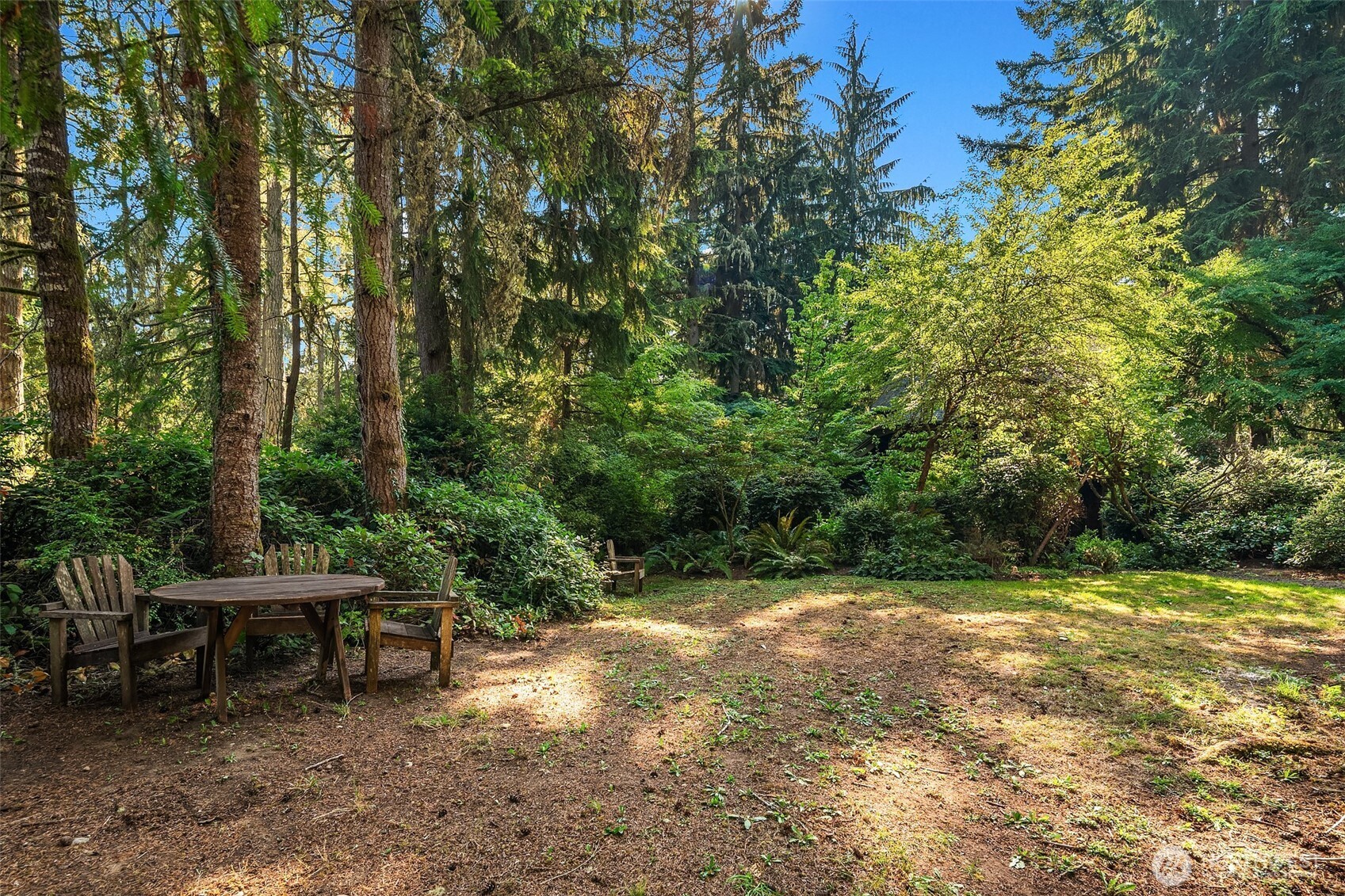 17804 Thorsen Road Southwest Vashon, WA 98070 - Photo 35 of 39 a view of a green field with sitting area