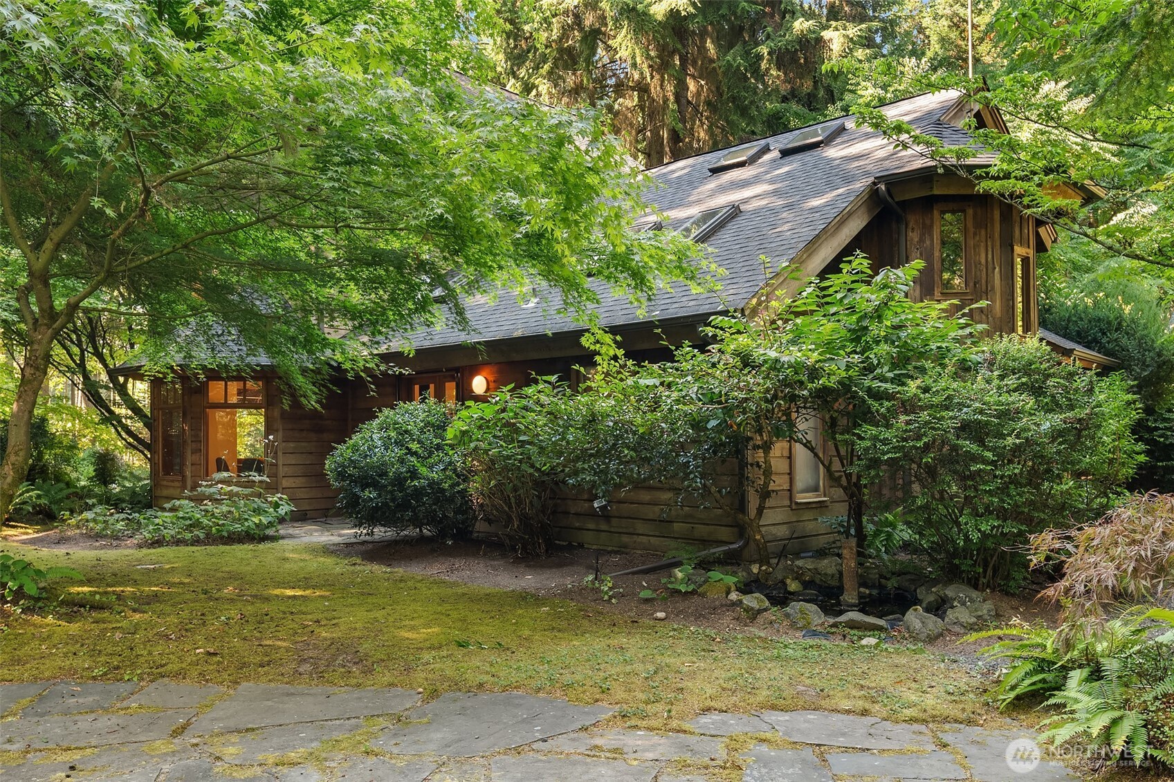 17804 Thorsen Road Southwest Vashon, WA 98070 - Photo 36 of 39 a backyard of a house with lots of green space