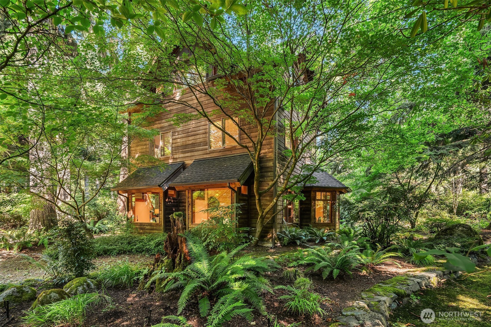 17804 Thorsen Road Southwest Vashon, WA 98070 - Photo 4 of 39 a view of a house with a tree