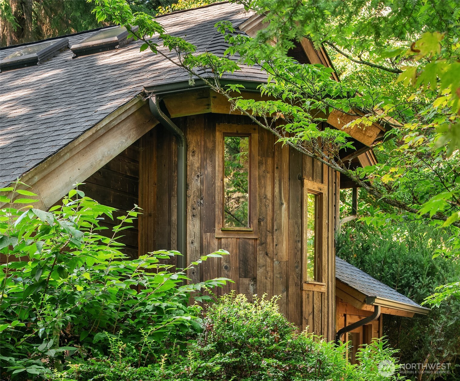 17804 Thorsen Road Southwest Vashon, WA 98070 - Photo 5 of 39 a view of a wooden door of the house