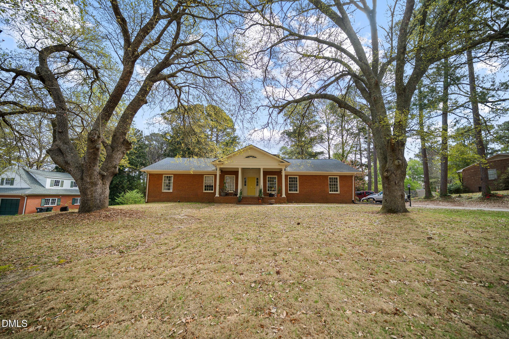 a house with trees in front of it