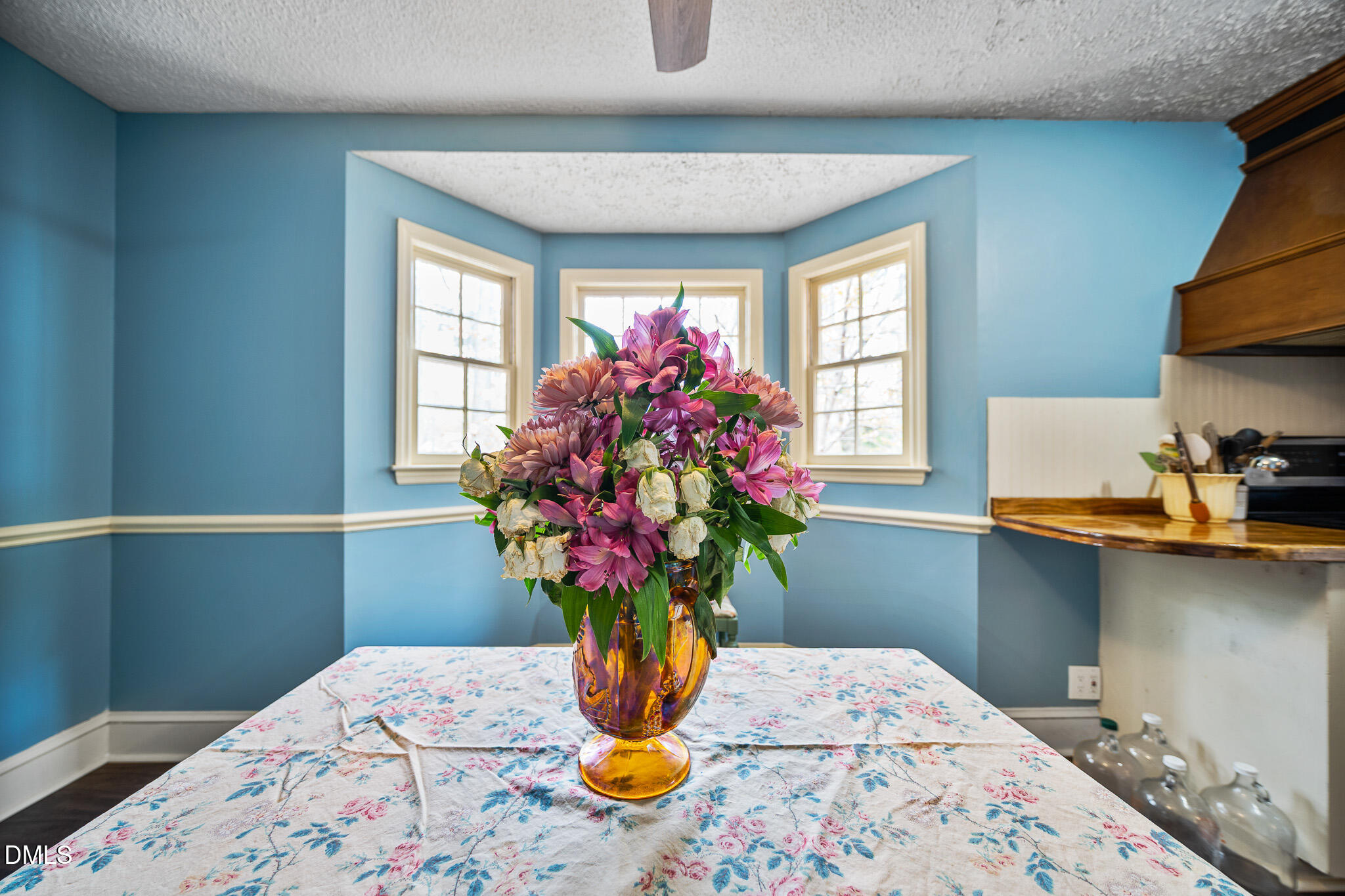 79 South Pleasant Street Angier, NC 27501 - Photo 11 of 52 a vase of flowers sitting on a table