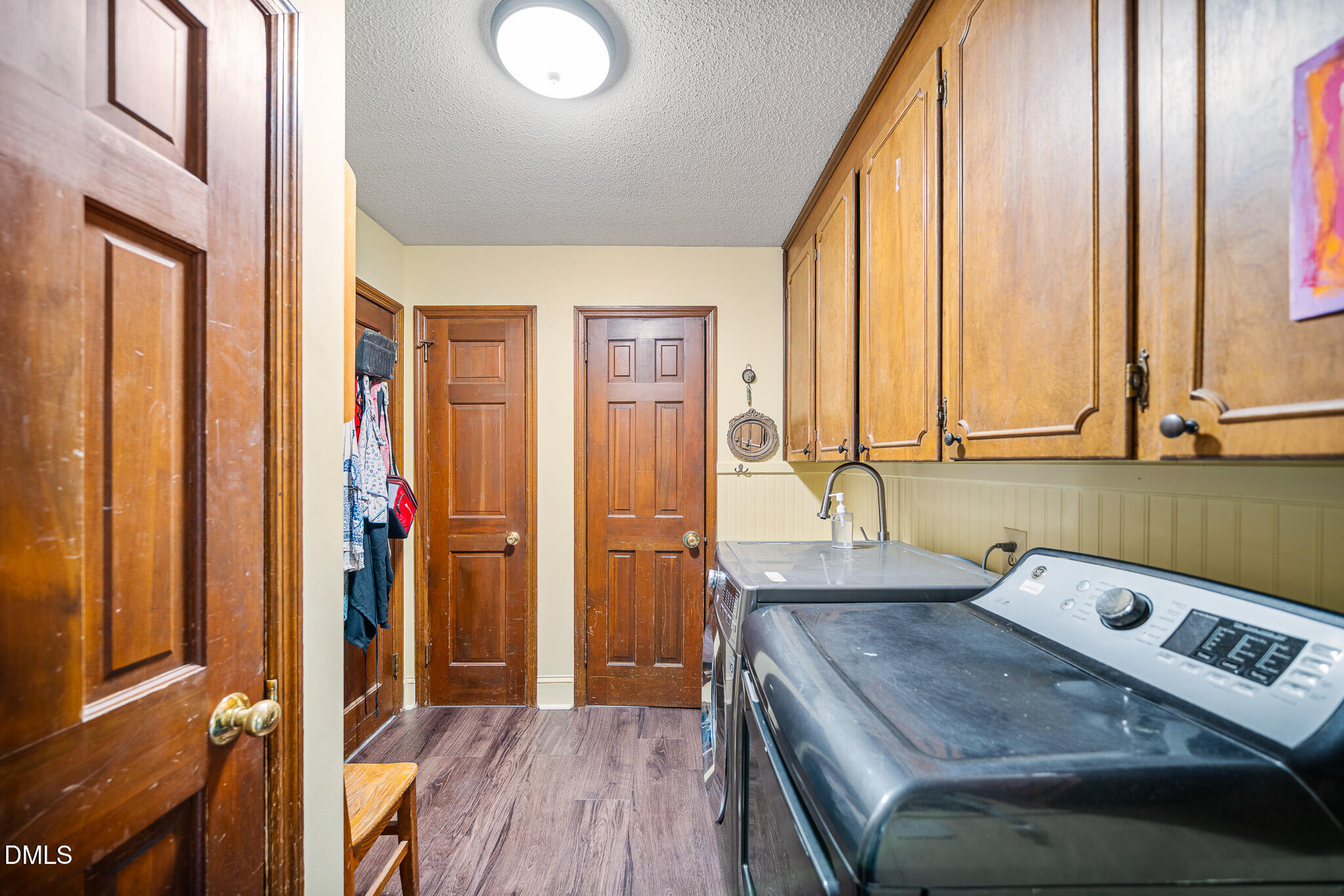 79 South Pleasant Street Angier, NC 27501 - Photo 16 of 52 a bathroom with a sink and a mirror