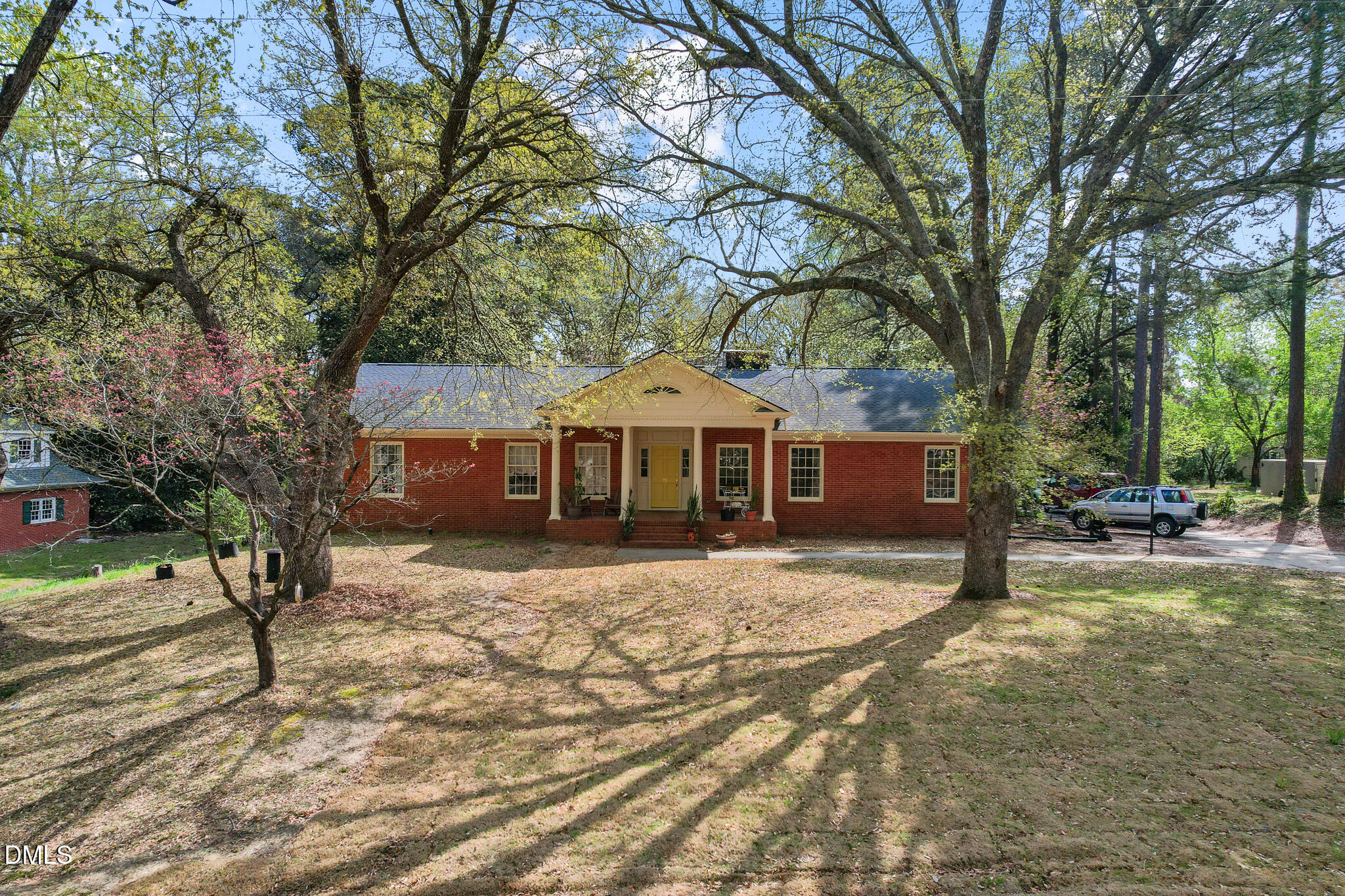79 South Pleasant Street Angier, NC 27501 - Photo 2 of 52 a front view of a house with a yard