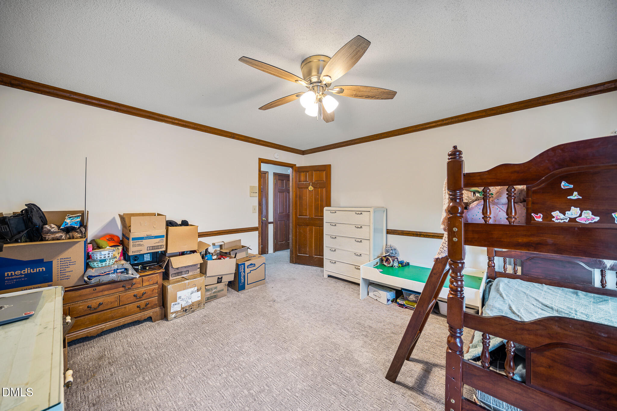 79 South Pleasant Street Angier, NC 27501 - Photo 23 of 52 a living room with furniture and a flat screen tv
