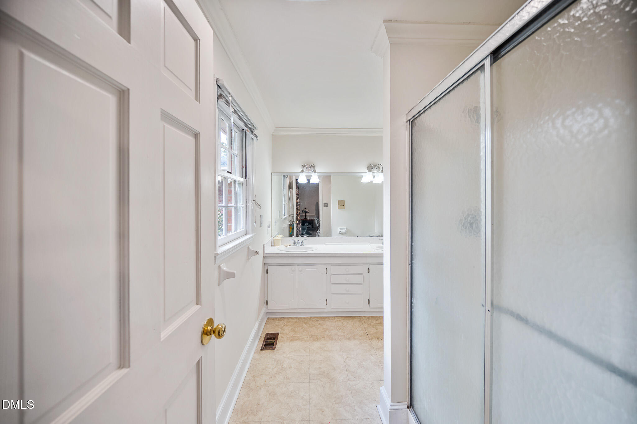 79 South Pleasant Street Angier, NC 27501 - Photo 29 of 52 a bathroom with a tub sink vanity and mirror