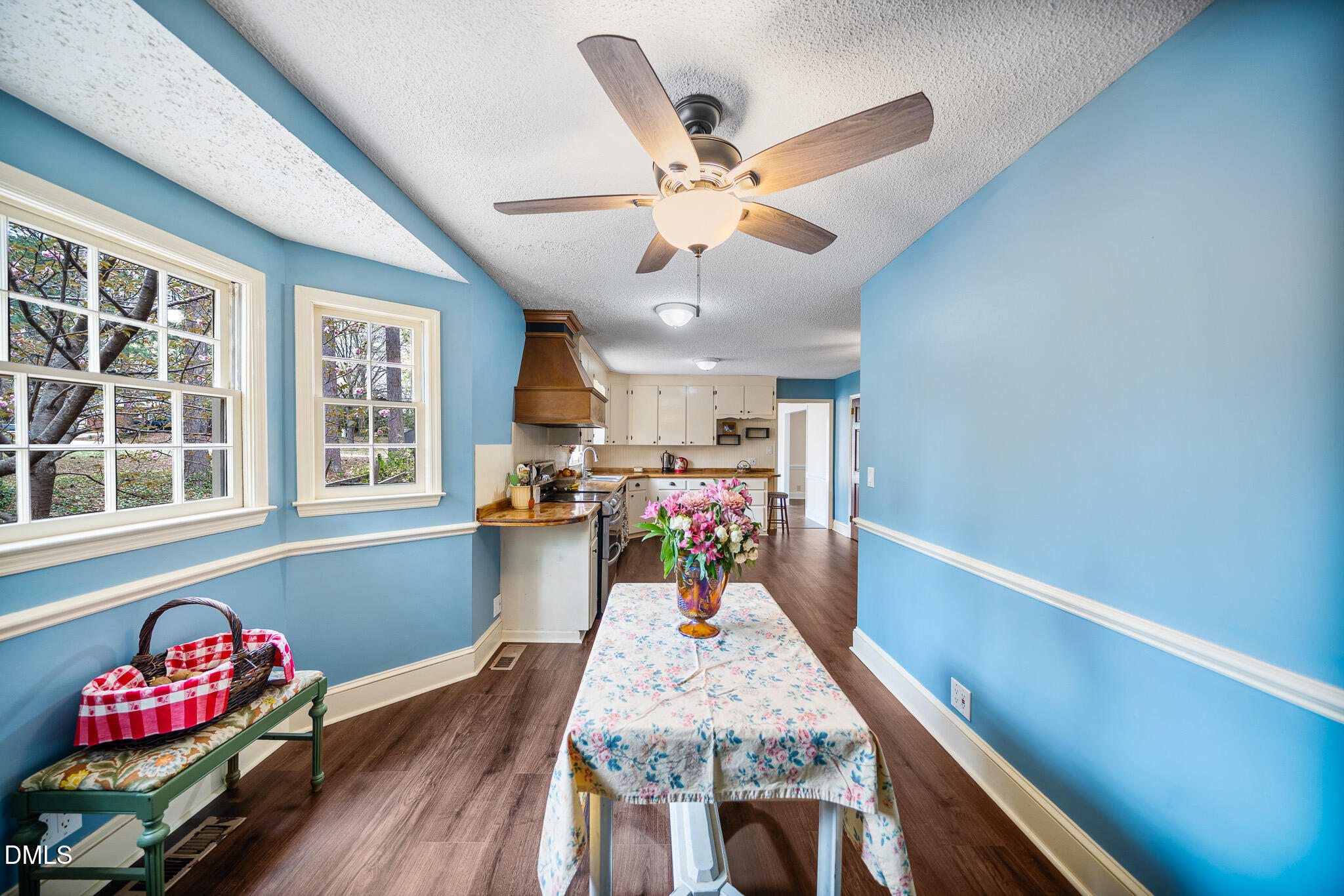 79 South Pleasant Street Angier, NC 27501 - Photo 33 of 52 a living room with furniture and a chandelier