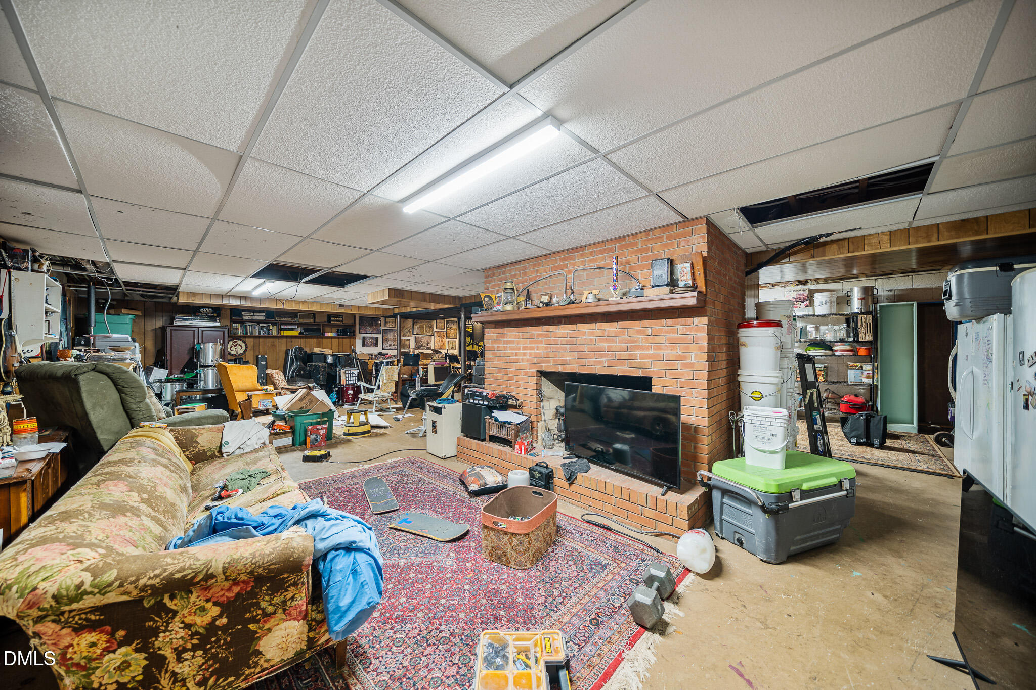 79 South Pleasant Street Angier, NC 27501 - Photo 47 of 52 a living room with furniture and a fireplace