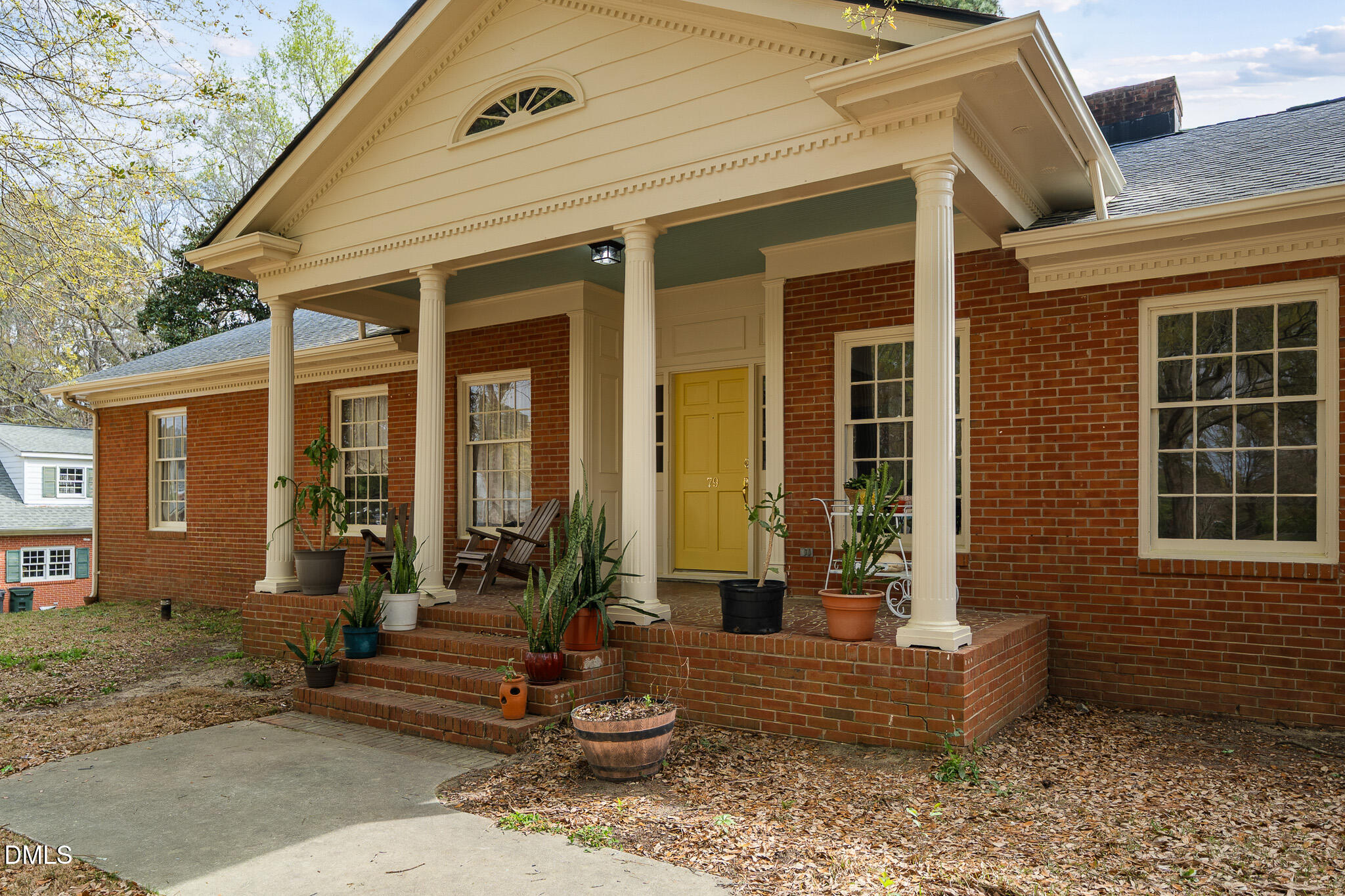 79 South Pleasant Street Angier, NC 27501 - Photo 48 of 52 a front view of a house with porch