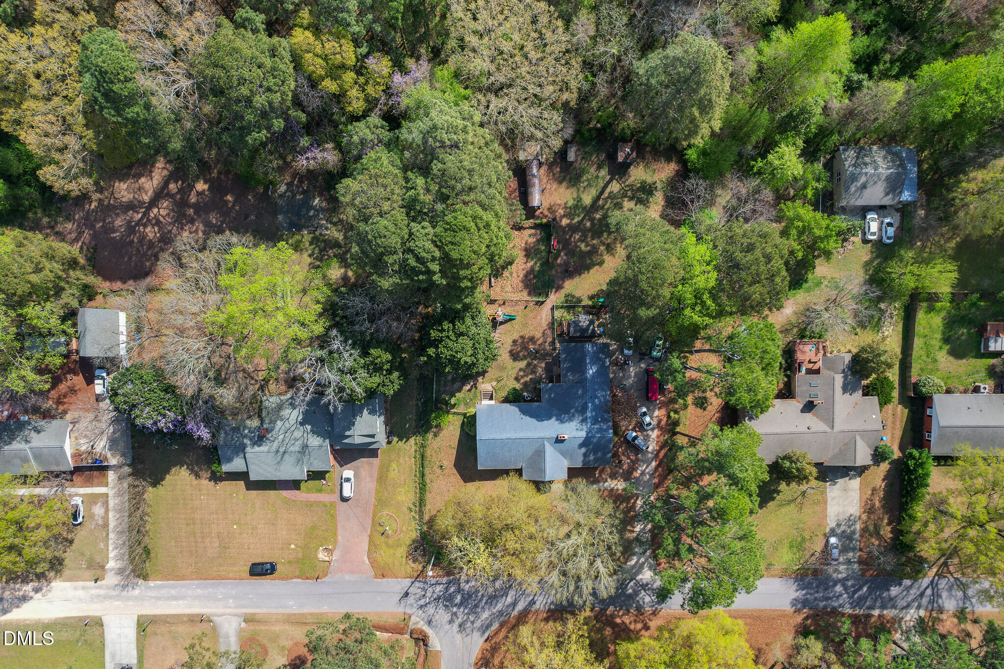 79 South Pleasant Street Angier, NC 27501 - Photo 52 of 52 an aerial view of residential house with outdoor space and trees all around