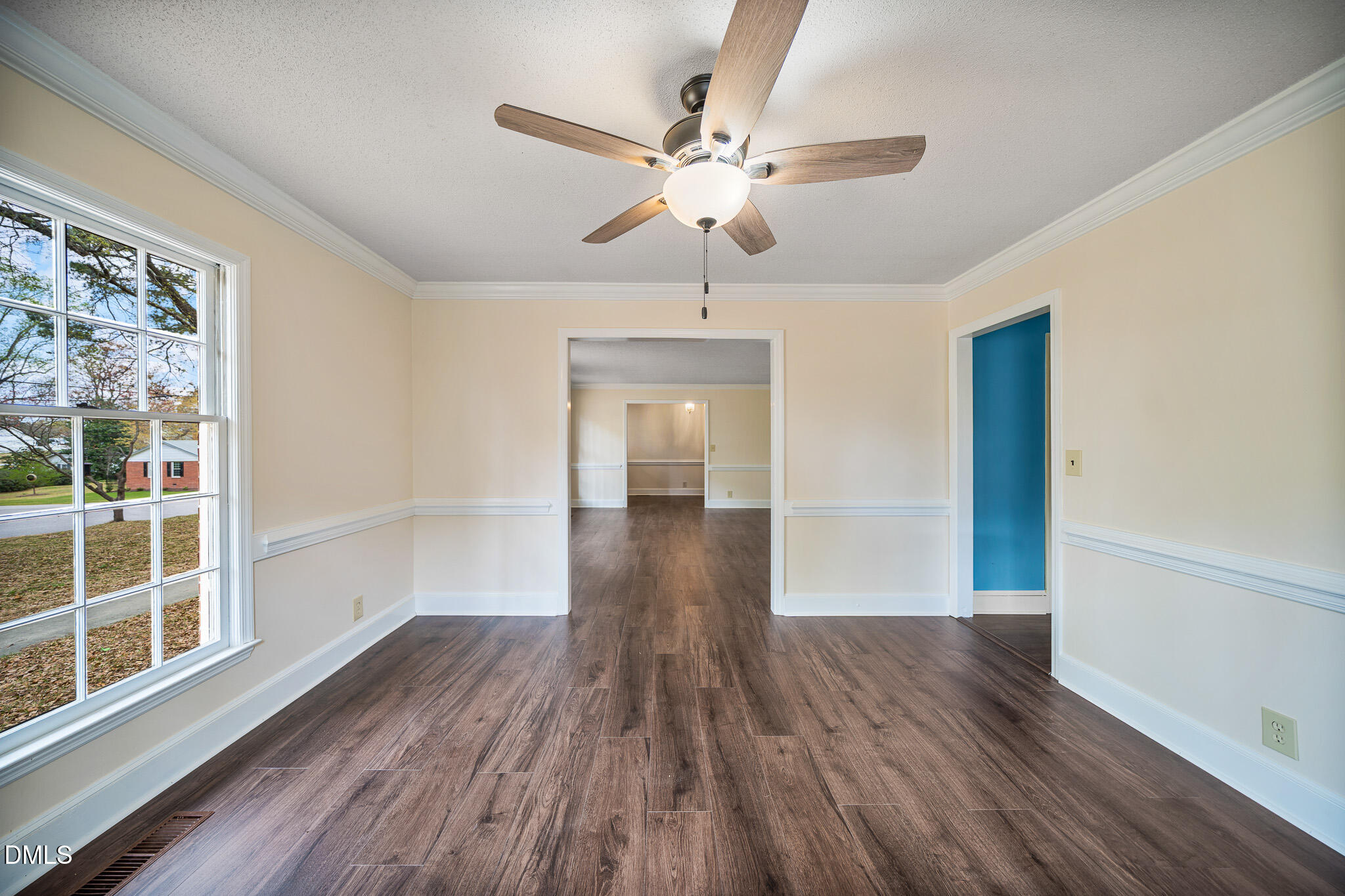 79 South Pleasant Street Angier, NC 27501 - Photo 7 of 52 a view of empty room with wooden floor
