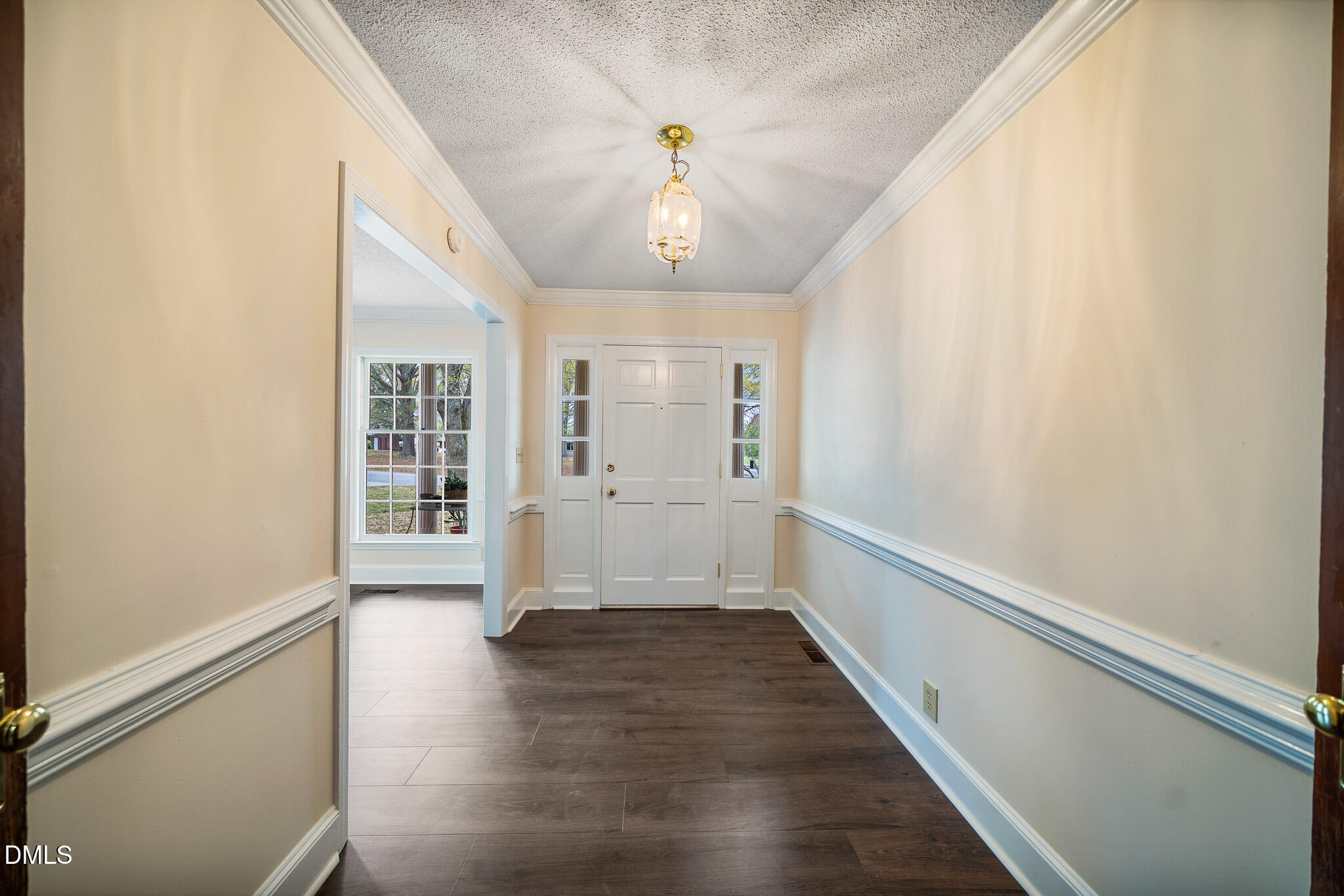 79 South Pleasant Street Angier, NC 27501 - Photo 9 of 52 a view of an entryway with wooden floor