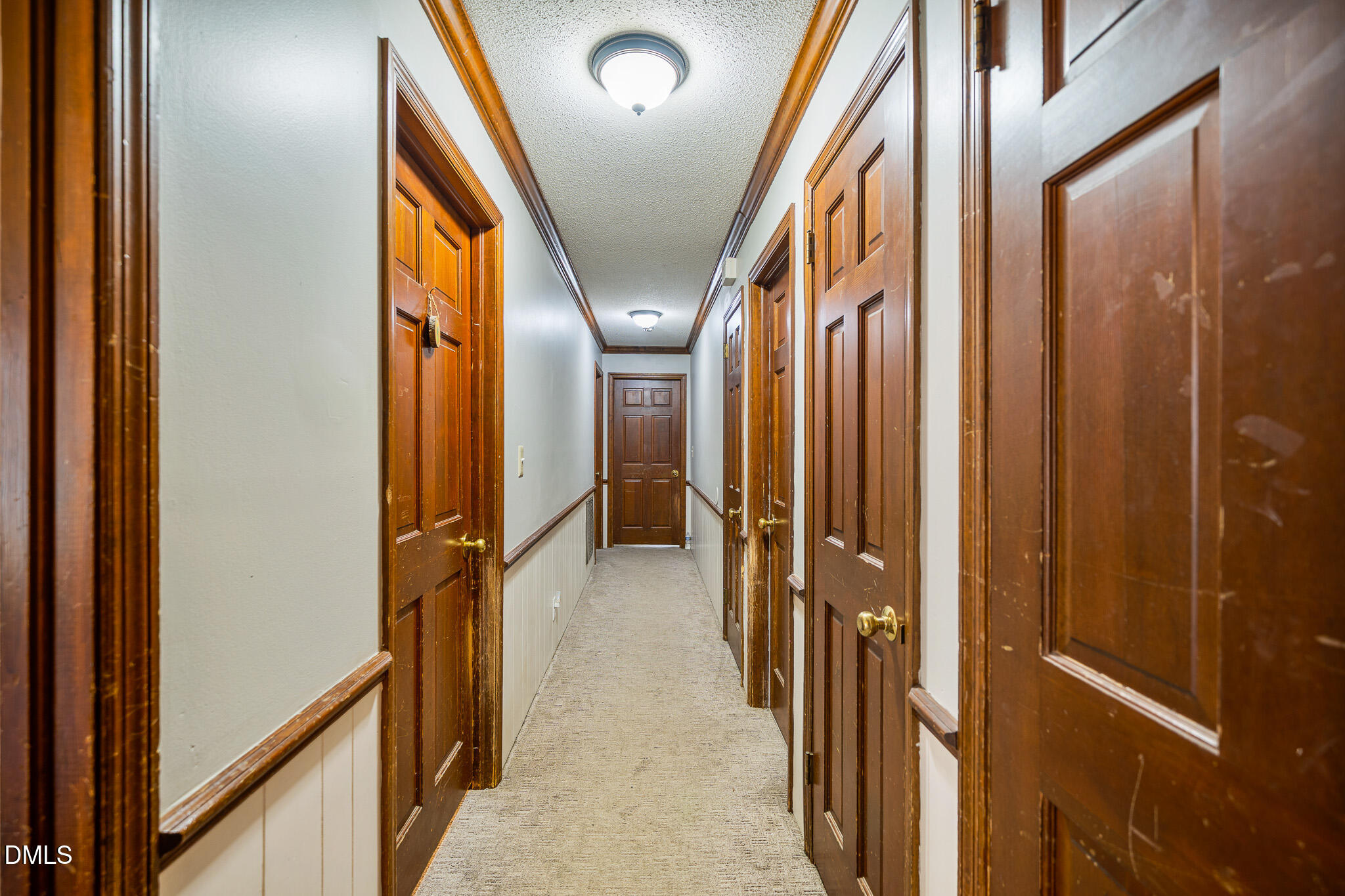 79 South Pleasant Street Angier, NC 27501 - Photo 10 of 52 a view of hallway with furniture and a gate