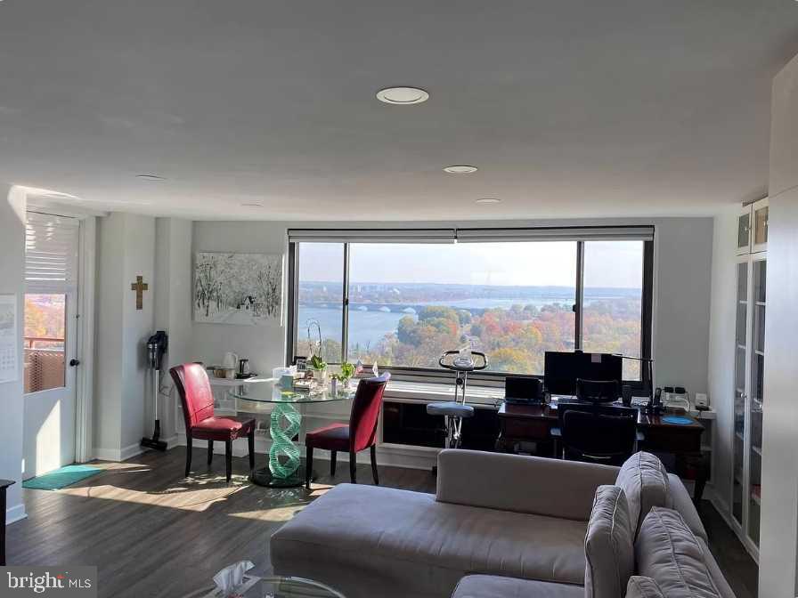 1011 Arlington Boulevard, Unit 1030 Arlington, VA 22209 - Photo 1 of 26 a living room with furniture and a large window
