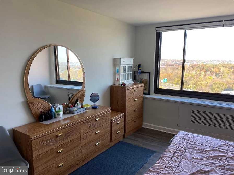1011 Arlington Boulevard, Unit 1030 Arlington, VA 22209 - Photo 13 of 26 a room with furniture and a window