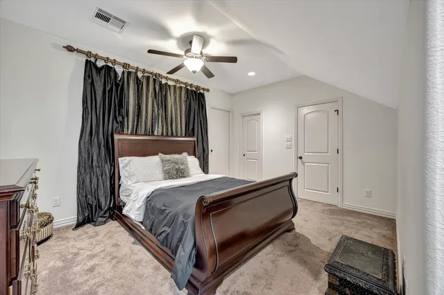 a view of a hallway with livingroom and furniture