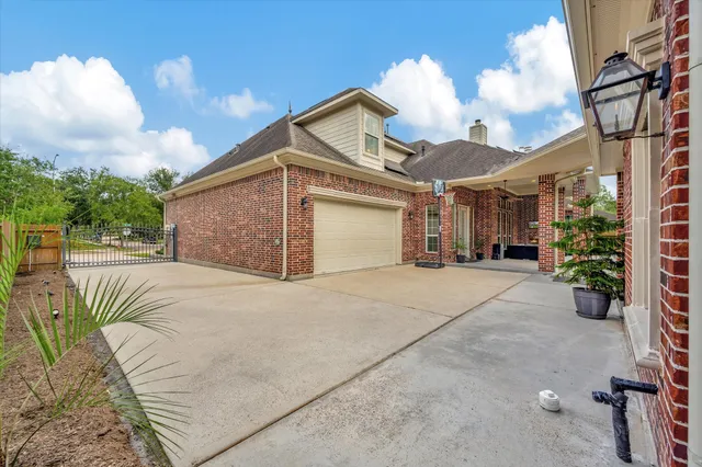 a patio with a garden and entertaining space