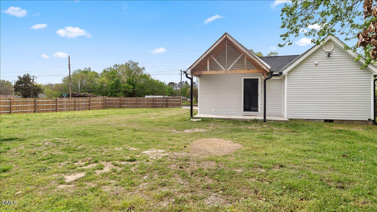 1284 Railroad Road Henderson, NC 27536 - Photo 29 of 35 a front view of house with garden