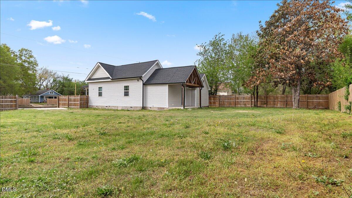 1284 Railroad Road Henderson, NC 27536 - Photo 30 of 35 a front view of house with yard and green space