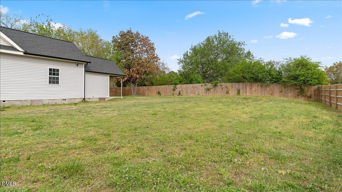 1284 Railroad Road Henderson, NC 27536 - Photo 31 of 35 a swimming pool with trees in the background