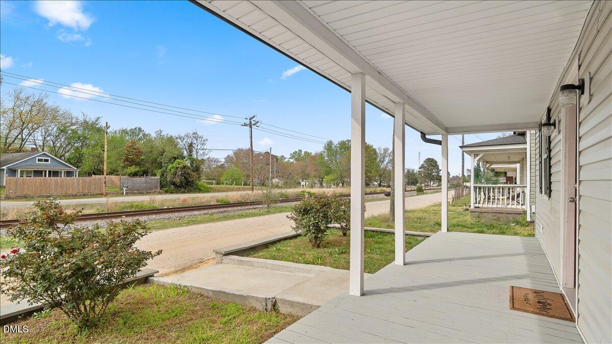 1284 Railroad Road Henderson, NC 27536 - Photo 32 of 35 a view of a balcony with yard