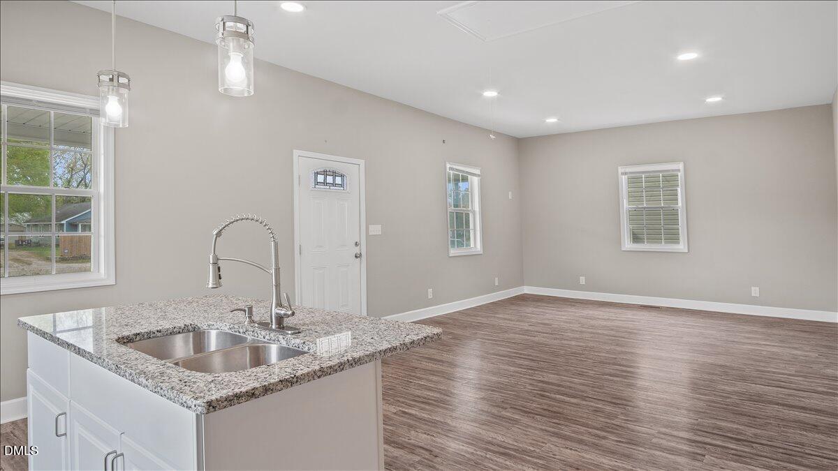 1284 Railroad Road Henderson, NC 27536 - Photo 8 of 35 a bathroom with sink shower and mirror