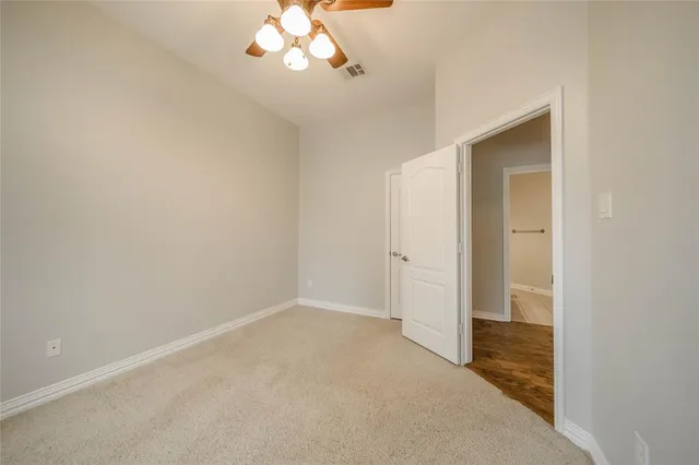 an empty room with a bathroom