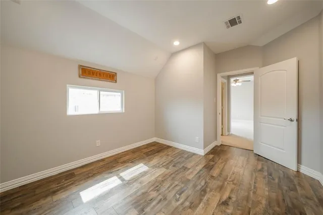 a bathroom with a toilet sink and shower