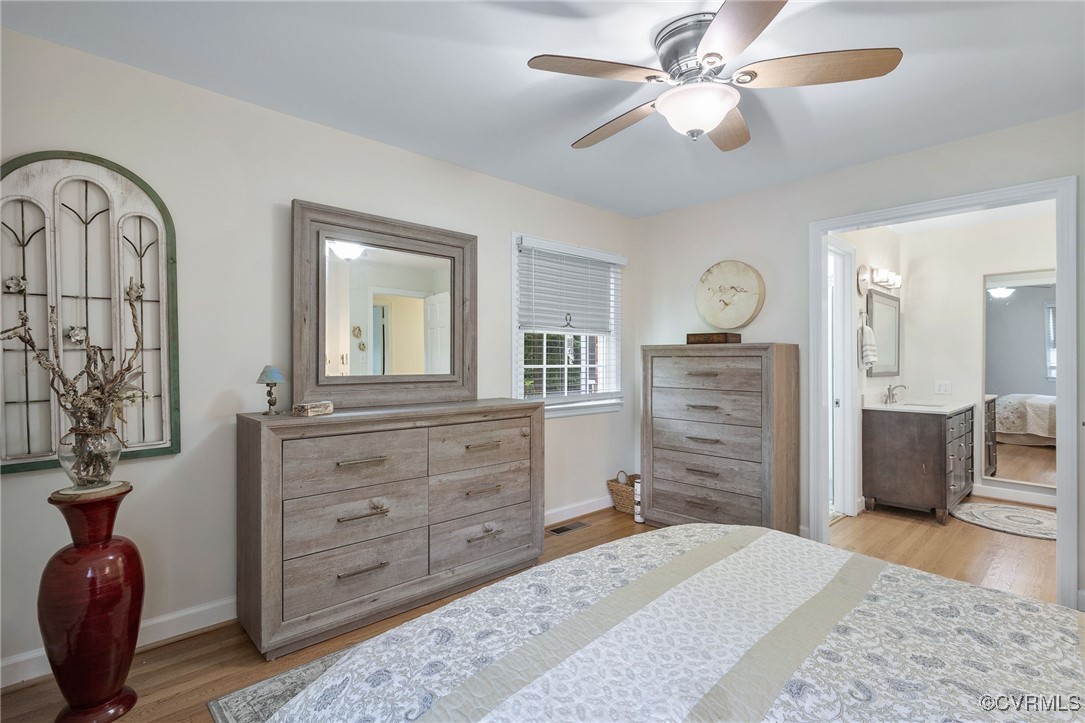6412 Gaines Mill Road Mechanicsville, VA 23111 - Photo 17 of 33 a bedroom with a bed and a dresser