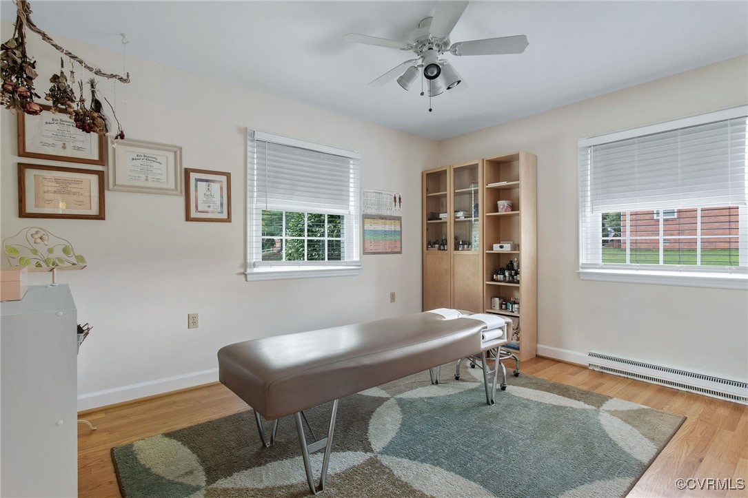 6412 Gaines Mill Road Mechanicsville, VA 23111 - Photo 19 of 33 a workspace with furniture window and wooden floor