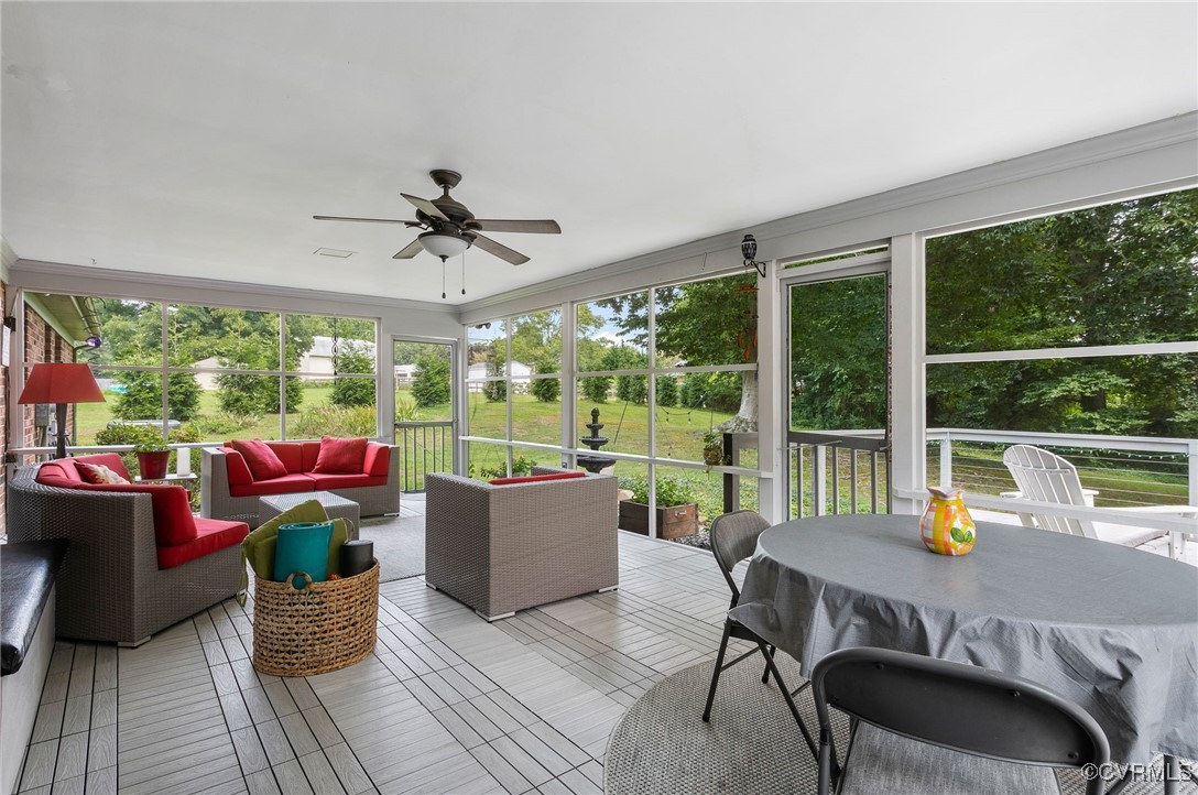 6412 Gaines Mill Road Mechanicsville, VA 23111 - Photo 28 of 33 a living room with furniture and a floor to ceiling window