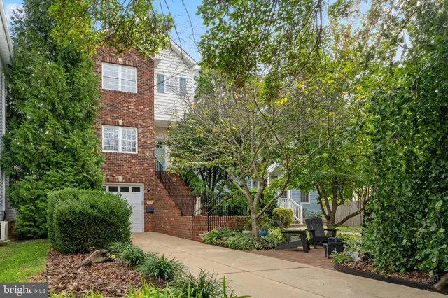 a view of a brick wall and windows