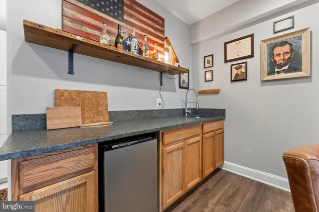 a bathroom with a toilet a sink and a shower