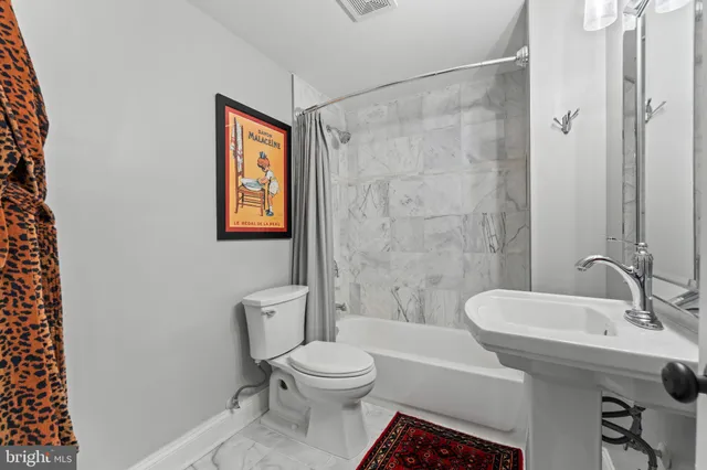 a view of a deck with table and chairs and wooden floor