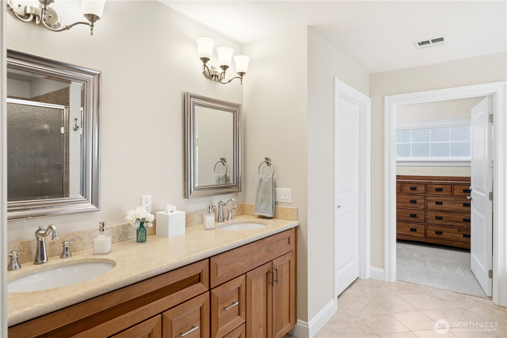 346 Dungeness Meadows Sequim, WA 98382 - Photo 16 of 36 a bathroom with a sink double vanity and a shower