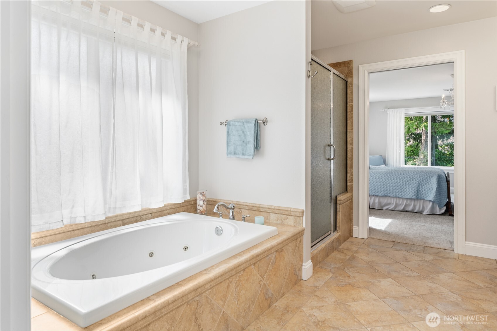 346 Dungeness Meadows Sequim, WA 98382 - Photo 17 of 36 a bathroom with a tub and a sink