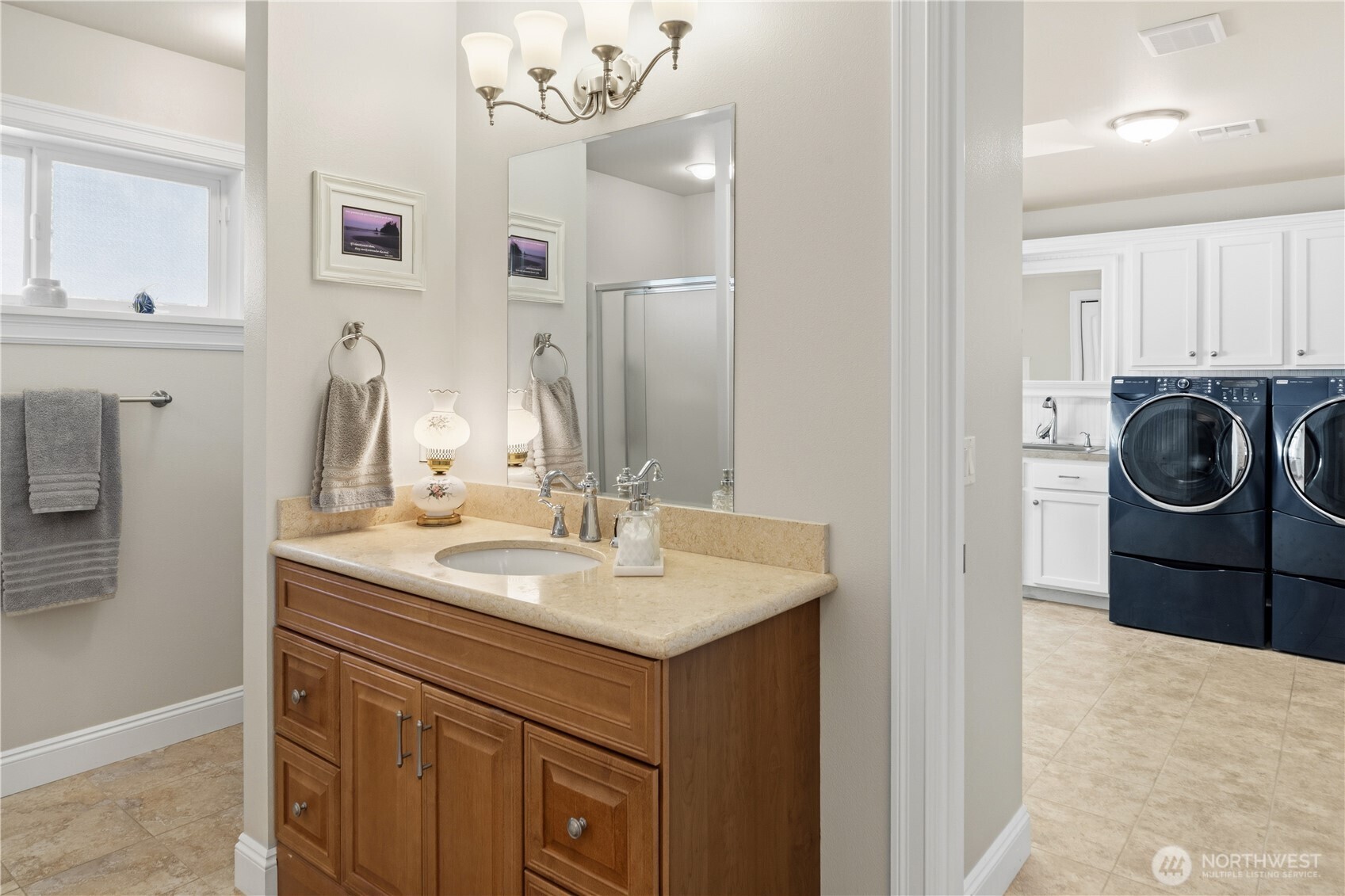 346 Dungeness Meadows Sequim, WA 98382 - Photo 20 of 36 a bathroom with a sink vanity and a mirror