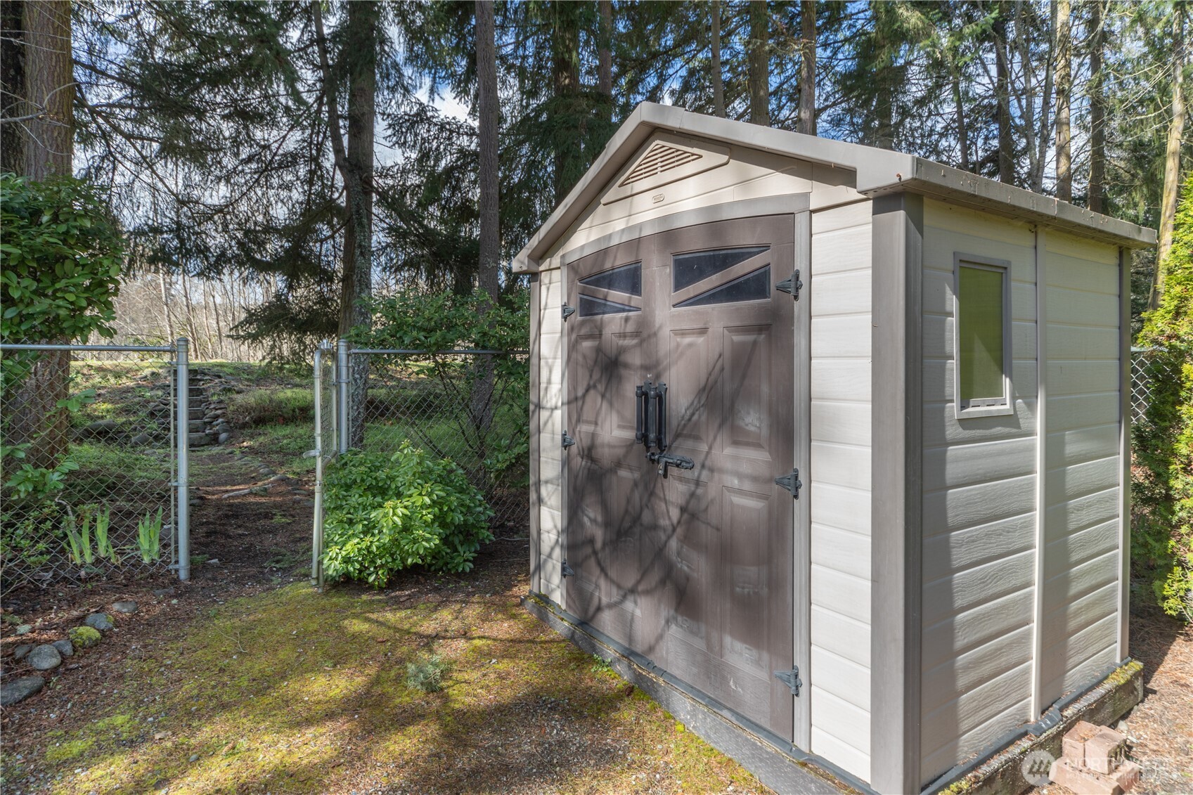 346 Dungeness Meadows Sequim, WA 98382 - Photo 28 of 36 a view of a small house with a yard
