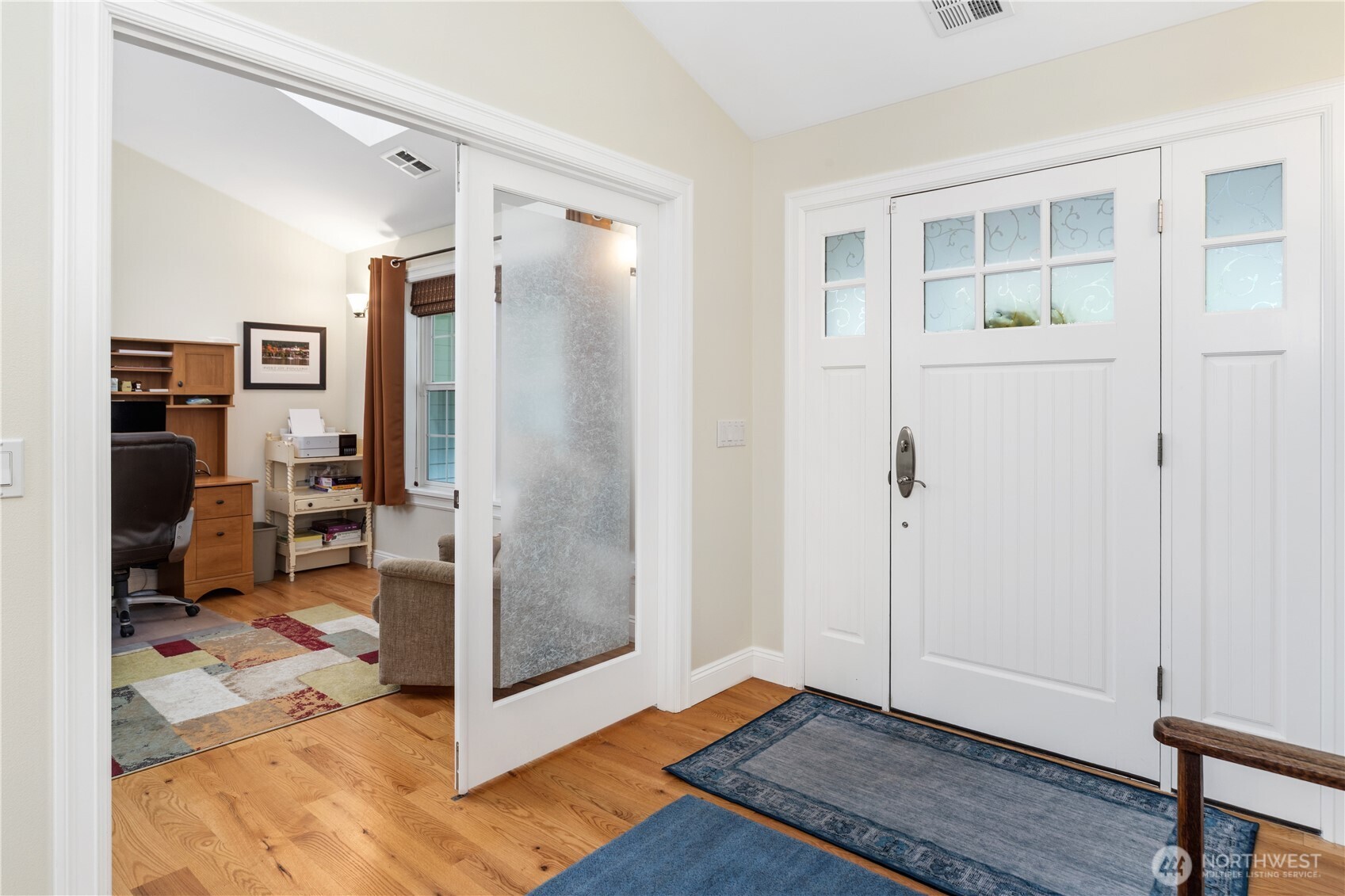 346 Dungeness Meadows Sequim, WA 98382 - Photo 5 of 36 a view of a livingroom with wooden floor and a bathroom