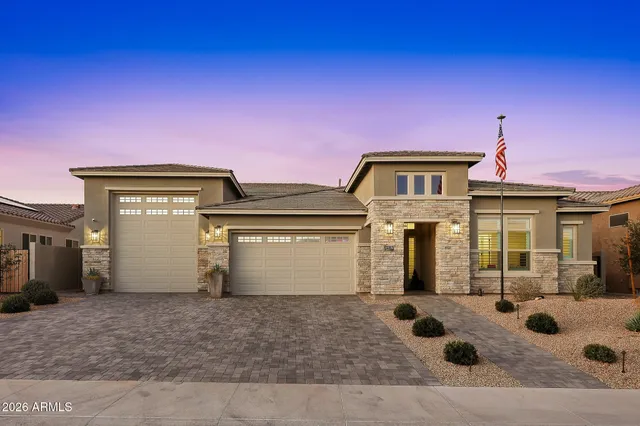 a front view of a house with parking space