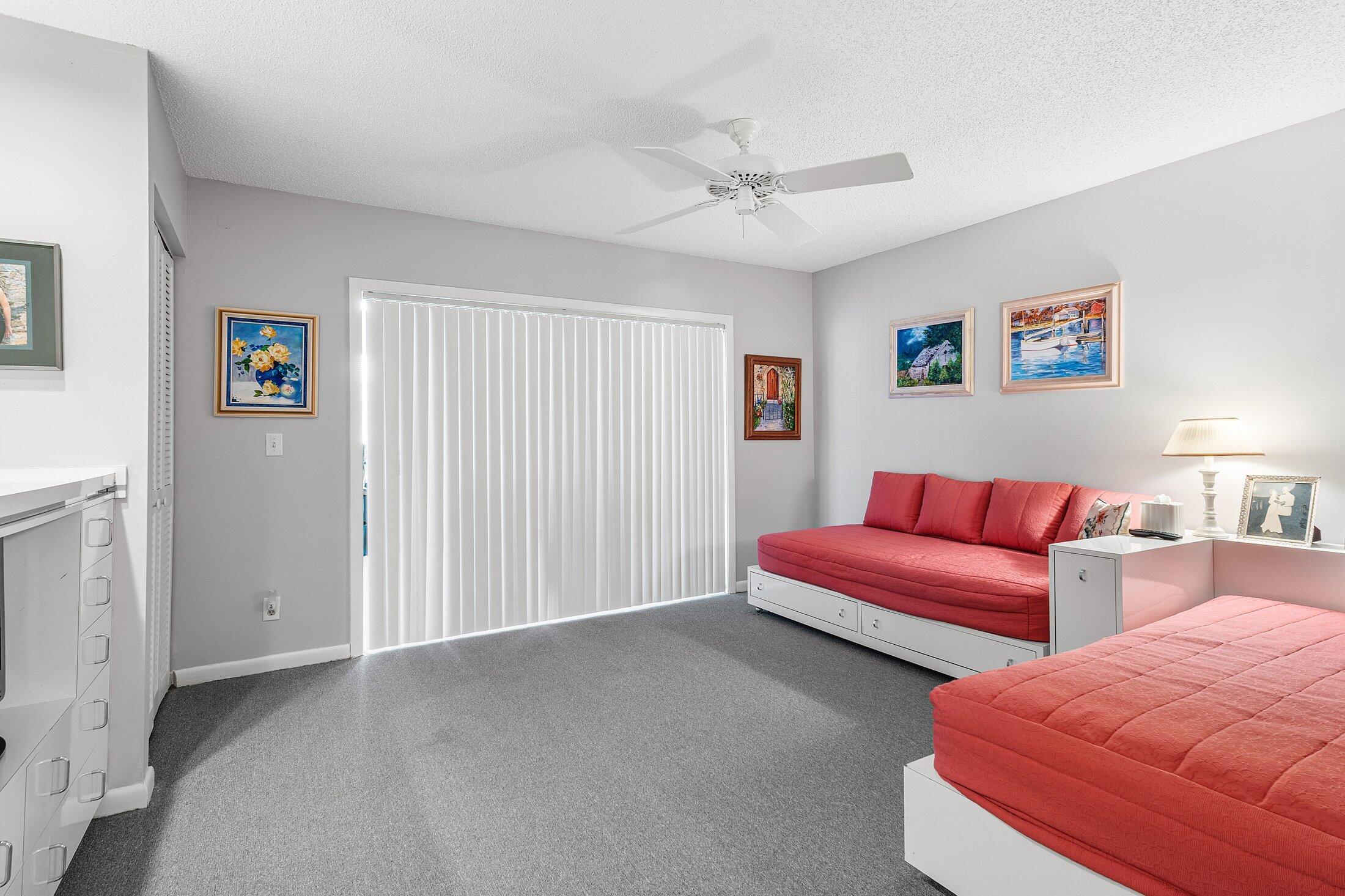 56 Woods Lane Boynton Beach, FL 33436 - Photo 28 of 77 a living room with furniture and a ceiling fan