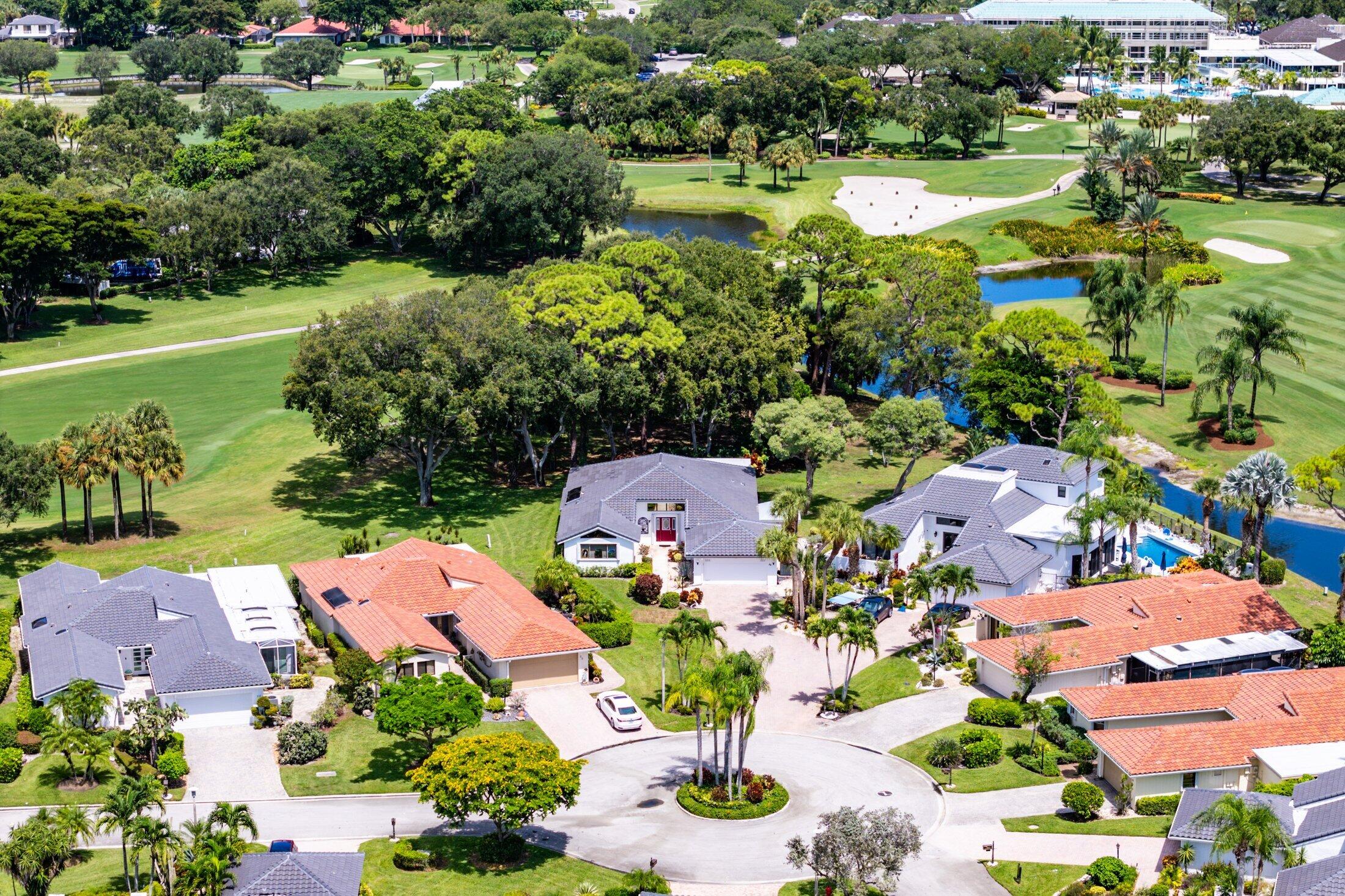 56 Woods Lane Boynton Beach, FL 33436 - Photo 57 of 77 an aerial view of a houses with a lake and lake view