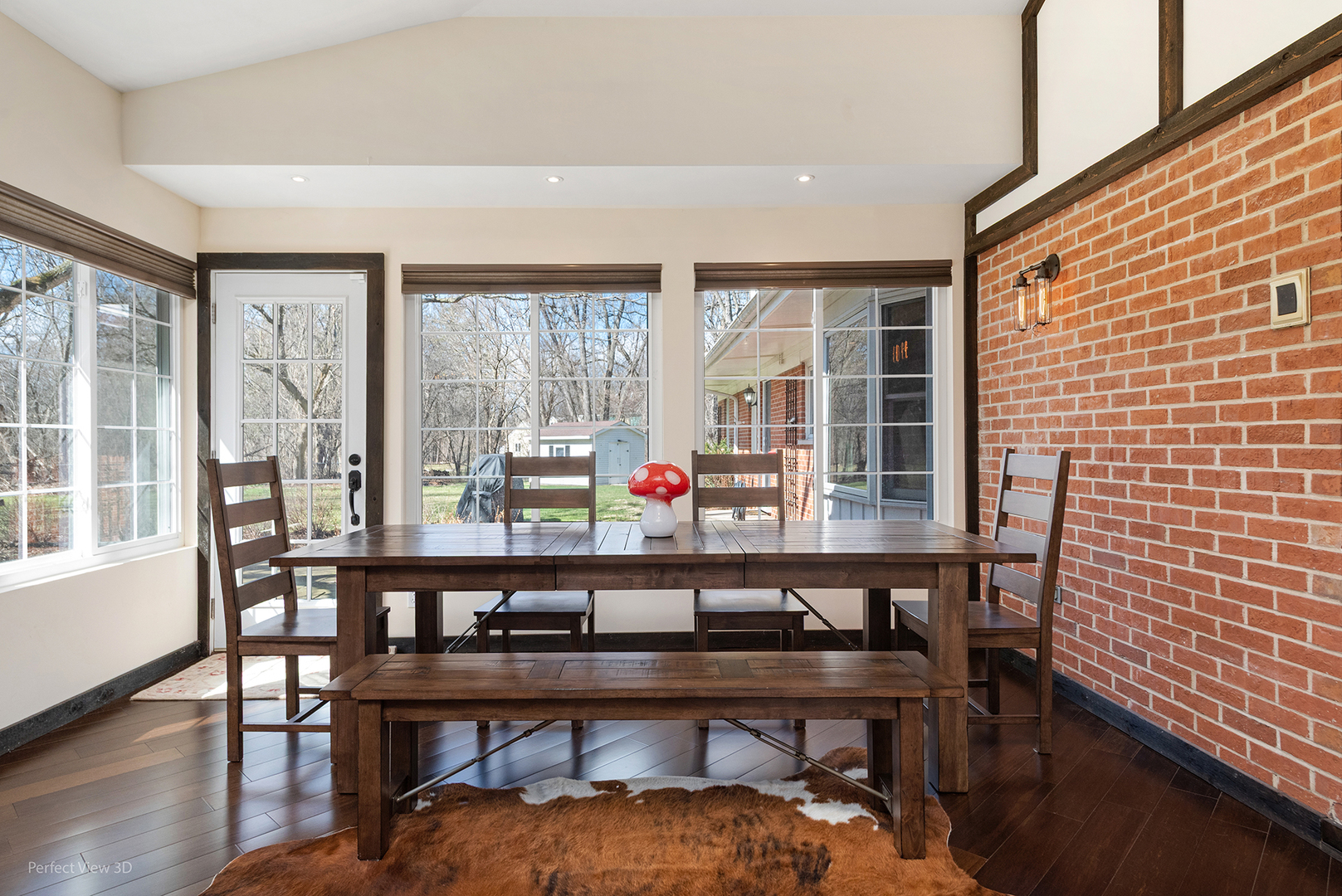 32-w050 Cedar Lane Wayne, IL 60184 - Photo 12 of 38 a room with furniture wooden floor and a window