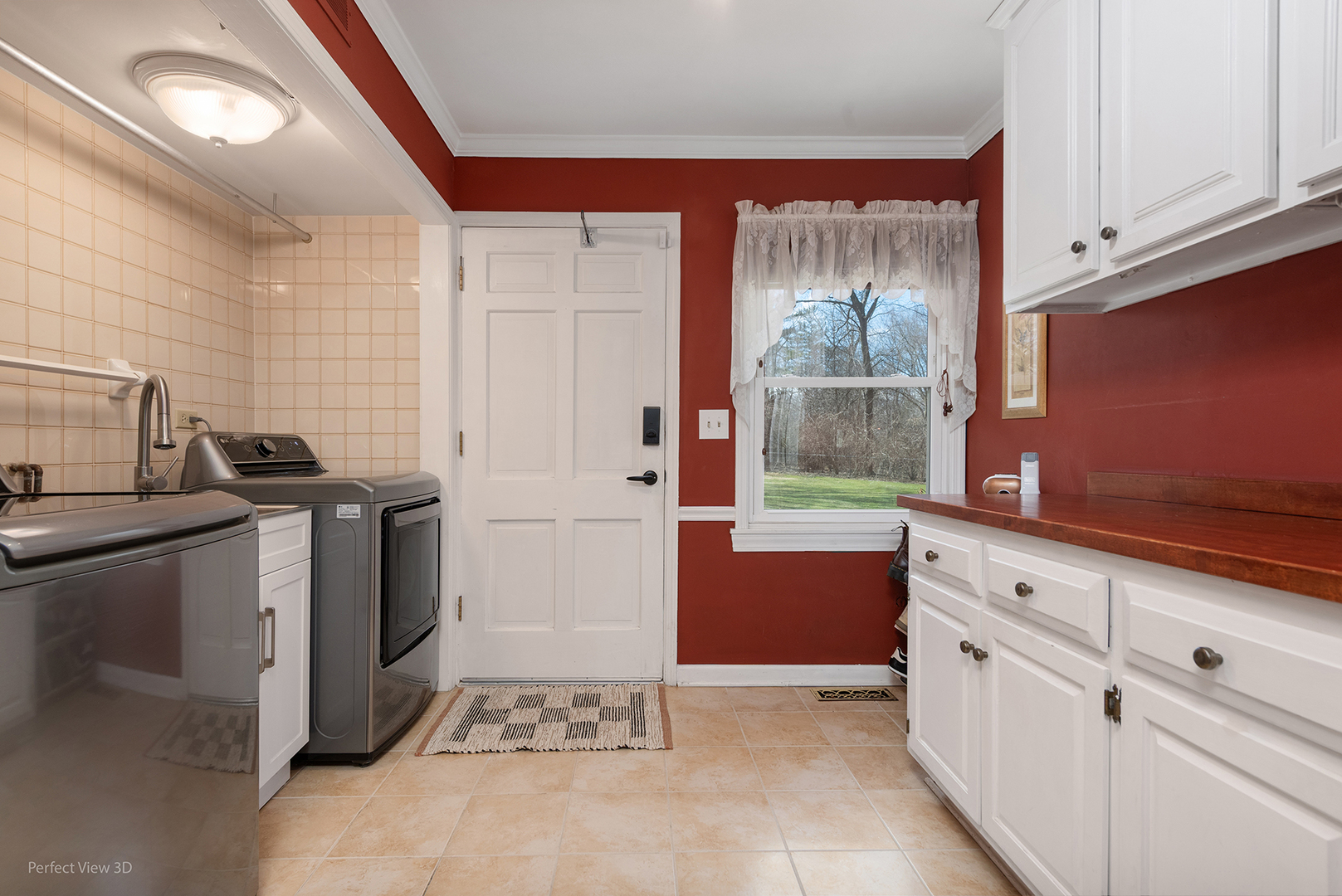 32-w050 Cedar Lane Wayne, IL 60184 - Photo 16 of 38 a kitchen with white cabinets and white appliances