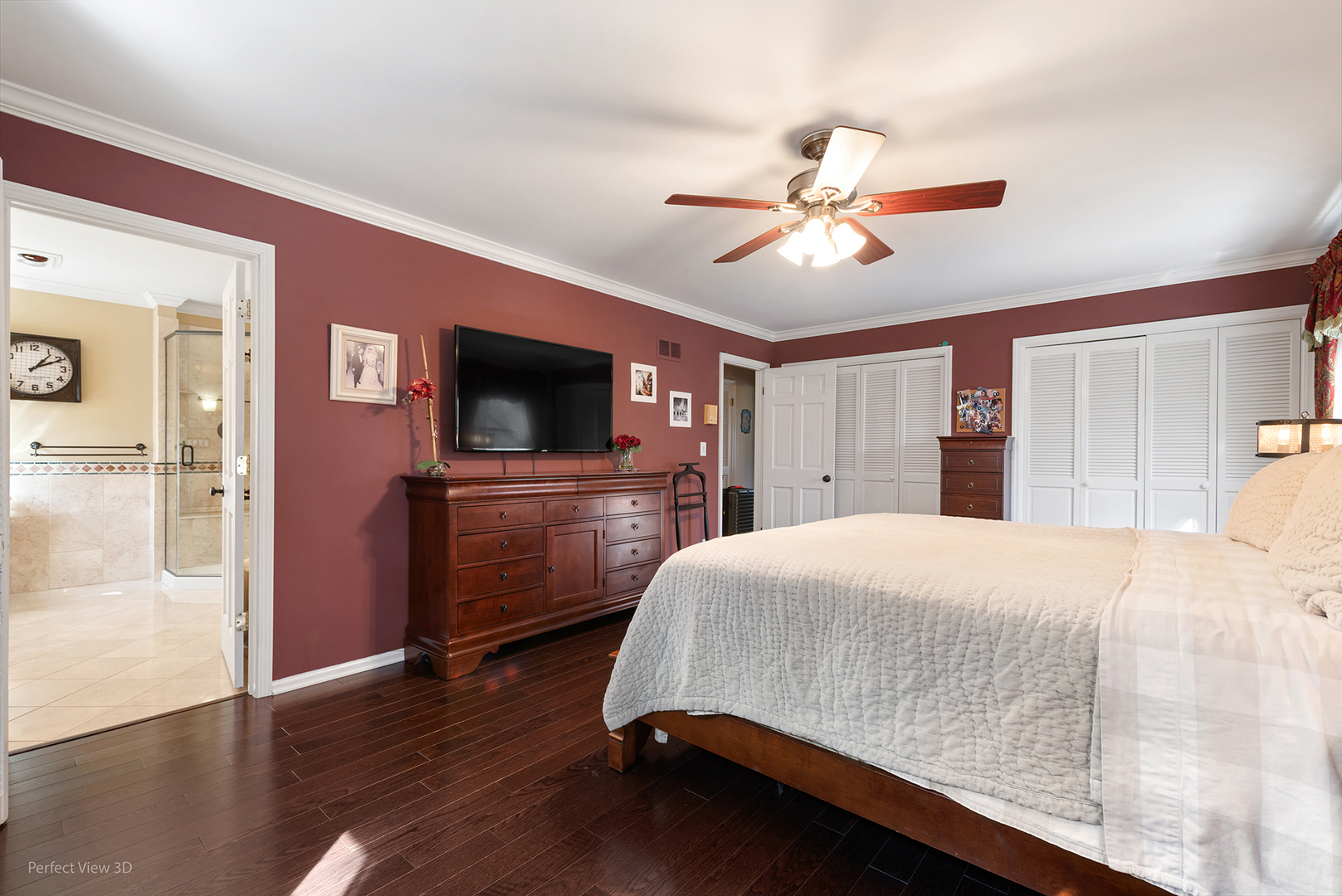 32-w050 Cedar Lane Wayne, IL 60184 - Photo 20 of 38 a living room with a bed and a flat screen tv