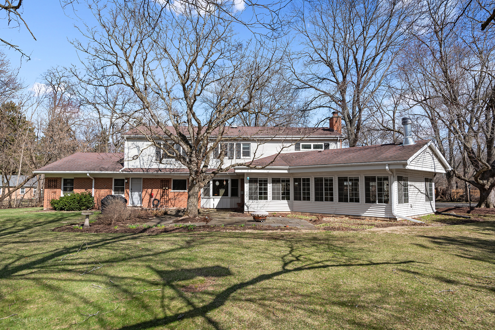 32-w050 Cedar Lane Wayne, IL 60184 - Photo 31 of 38 a front view of a building with a garden