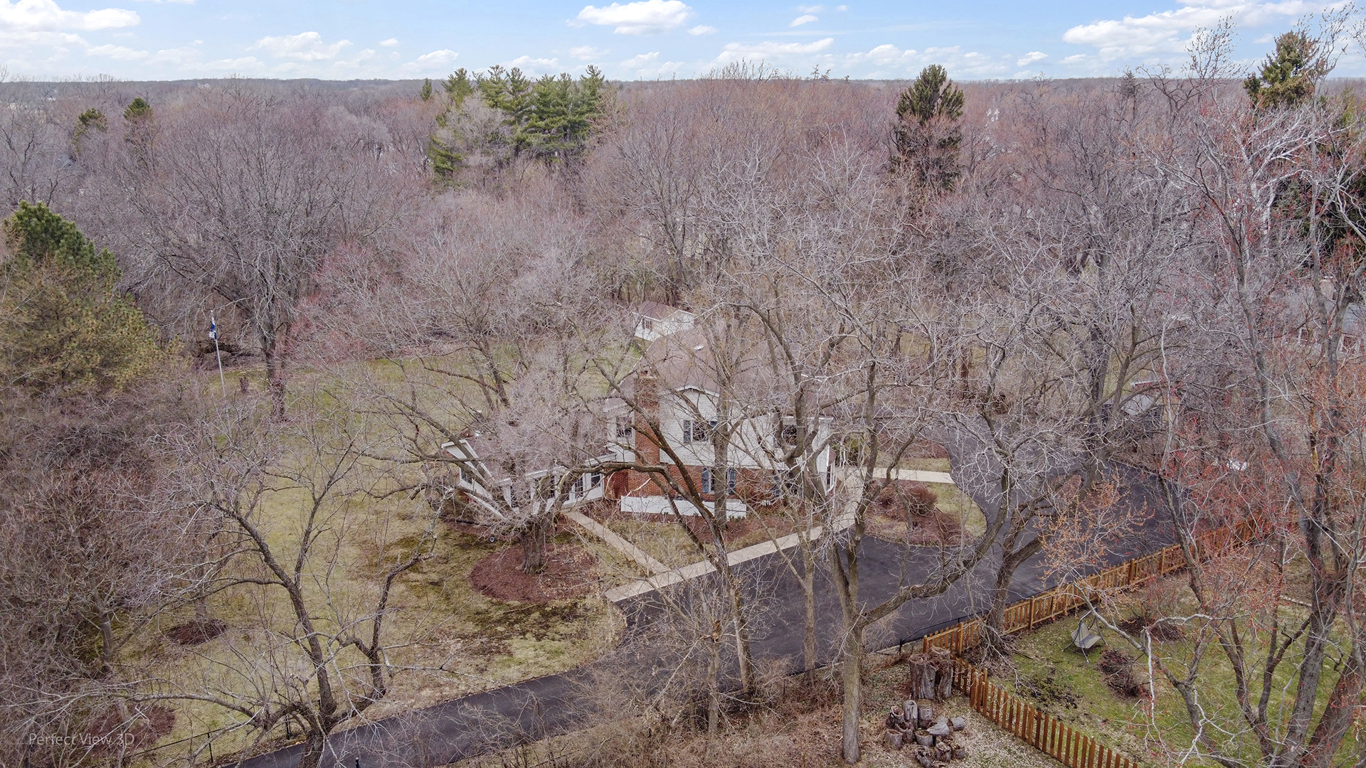 32-w050 Cedar Lane Wayne, IL 60184 - Photo 32 of 38 a view of a dry yard with wooden fence