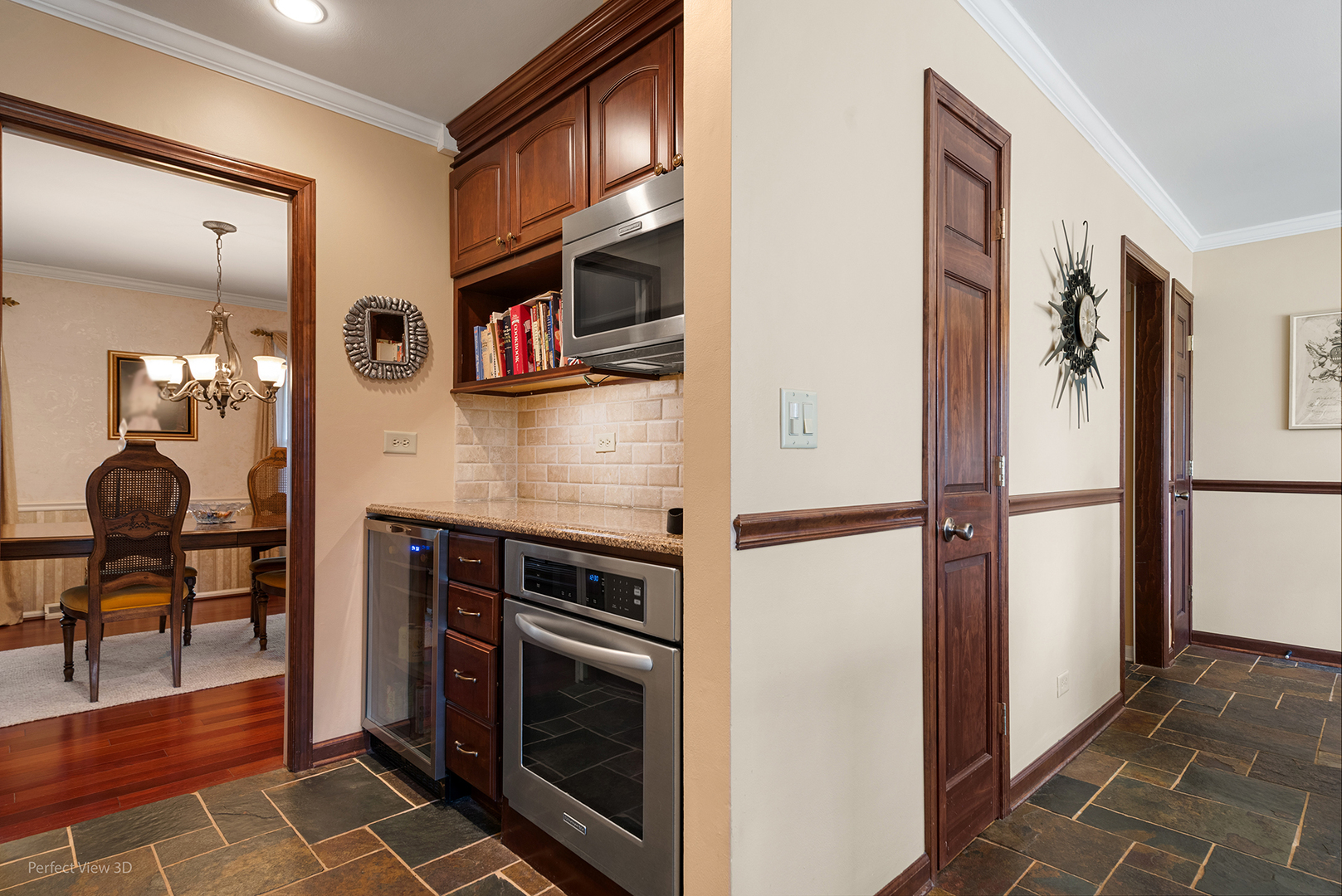 32-w050 Cedar Lane Wayne, IL 60184 - Photo 6 of 38 a kitchen with stainless steel appliances granite countertop a refrigerator and a stove