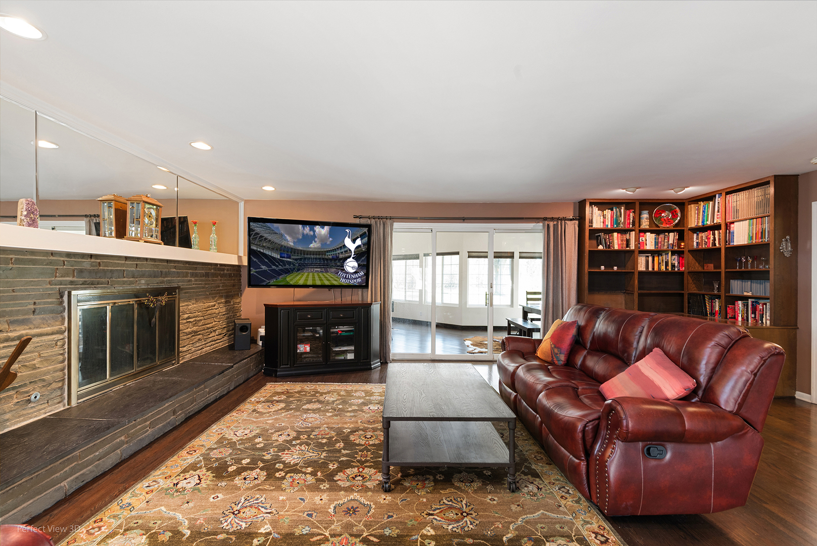 32-w050 Cedar Lane Wayne, IL 60184 - Photo 9 of 38 a living room with furniture and a fireplace