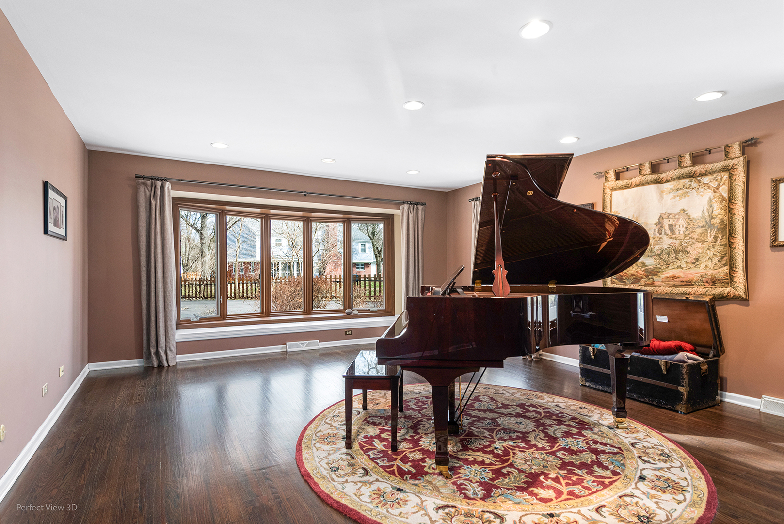 32-w050 Cedar Lane Wayne, IL 60184 - Photo 10 of 38 a living room with furniture a fireplace and a floor to ceiling window